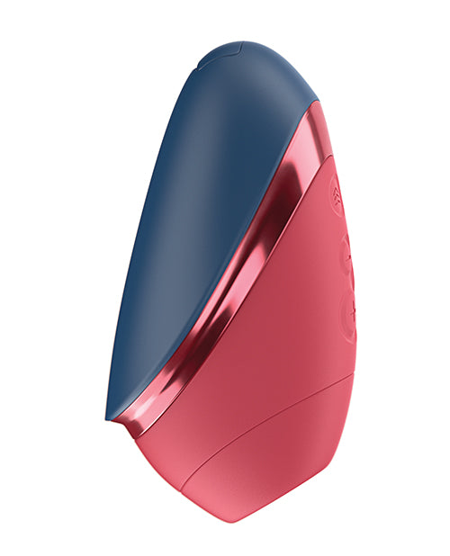 Estimulador de clítoris compacto Womanizer Next Liberty con tecnología Pleasure Air 3D, azul y rojo